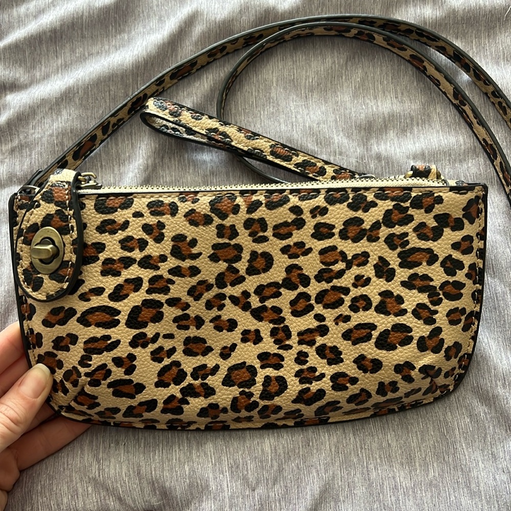 Fun little cheetah print clutch with full body strap!